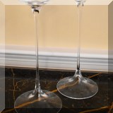 G04. Pair of signed Kosta Boda ”Fanfare” glass candlesticks. 11”h - $48